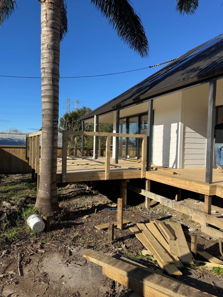 New timber deck and weatherboard cladding at the Te Atatu South home